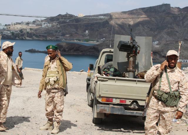 (260109) -- ADEN, Jan. 9, 2026 (Xinhua) -- Forces loyal to Yemen's Presidential Leadership Council (PLC) stand guard in Aden, Yemen, Jan. 8, 2026.
  Forces loyal to Yemen's PLC seized control of key state institutions in the southern port city of Aden on Wednesday after security units aligned with the Southern Transitional Council withdrew, a local government official said. (Xinhua)