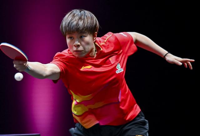 (260109) -- DOHA, Jan. 9, 2026 (Xinhua) -- Wang Yidi of China hits a return during the women's singles round of 16 match against Sofia Polcanova of Austria at the WTT Champions Doha 2026 in Doha, Qatar, Jan. 9, 2026. (Photo by Nikku/Xinhua)