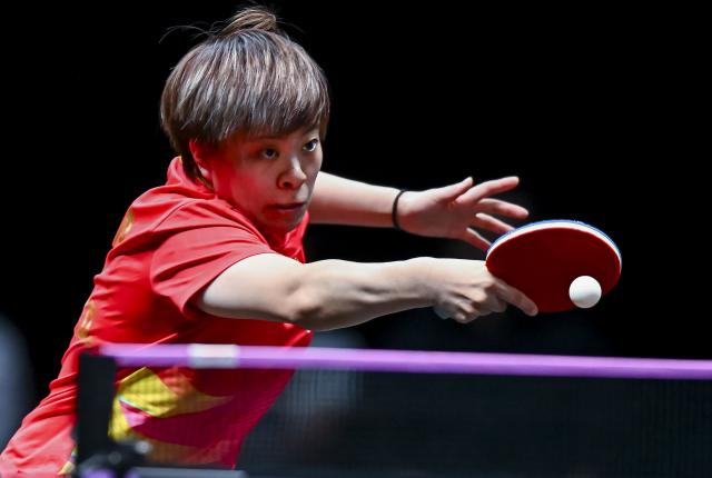 (260109) -- DOHA, Jan. 9, 2026 (Xinhua) -- Wang Yidi of China hits a return during the women's singles round of 16 match against Sofia Polcanova of Austria at the WTT Champions Doha 2026 in Doha, Qatar, Jan. 9, 2026. (Photo by Nikku/Xinhua)