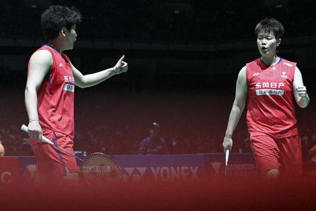 (260109) -- KUALA LUMPUR, Jan. 9, 2026 (Xinhua) -- Liu Shengshu (R)/Tan Ning of China react during the women's doubles quarterfinal match against Hiramoto Ririna/Ishikawa Kokona of Japan at the Malaysia Open 2026 badminton tournament in Kuala Lumpur, Malaysia, Jan. 9, 2026. (Xinhua/Cheng Yiheng)