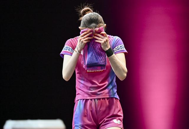 (260109) -- DOHA, Jan. 9, 2026 (Xinhua) -- Hayata Hina of Japan reacts during the women's singles Round of 16 match against Kuai Man of China at the WTT Champions Doha 2026 in Doha, Qatar, Jan. 9, 2026. (Photo by Nikku/Xinhua)