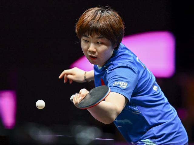 (260109) -- DOHA, Jan. 9, 2026 (Xinhua) -- Kuai Man of China hits a return during the women's singles Round of 16 match against Hayata Hina of Japan at the WTT Champions Doha 2026 in Doha, Qatar, Jan. 9, 2026. (Photo by Nikku/Xinhua)