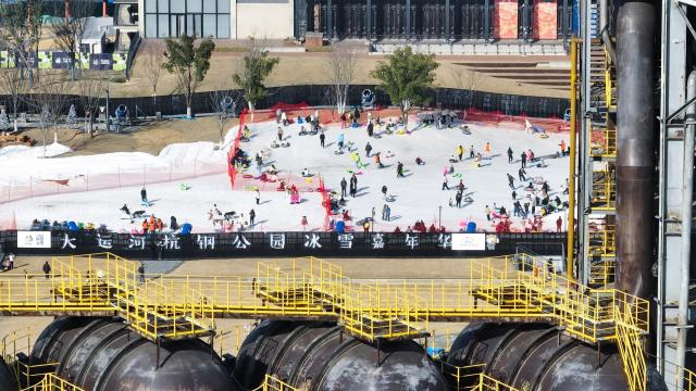 (260109) -- HANGZHOU, Jan. 9, 2026 (Xinhua) -- A drone photo taken on Jan. 9, 2026 shows people enjoying themselves at an ice and snow carnival in Hangzhou, east China's Zhejiang Province. An ice and snow carnival kicked off at the Hangzhou grand canal steelworks park on Friday, attracting visitors across the city.  
  Since 2020, Hangzhou has been undertaking the preservation and transformation of industrial relics from Hangzhou iron and steel group's factory, aiming to create an urban complex park that integrates industrial, commercial, and recreational facilities. Currently, the first phase of the construction project has been put into use, while the second phase is set to be completed and operational by 2028. (Xinhua/Weng Xinyang)