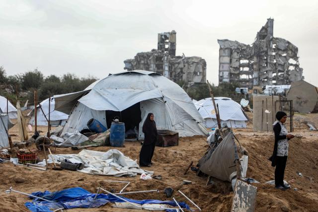 (260109) -- GAZA, Jan. 9, 2026 (Xinhua) -- Palestinians inspect the damage caused by an Israeli strike that targeted a camp housing displaced people in Gaza City, on Jan. 9, 2026. (Photo by Rizek Abdeljawad/Xinhua)