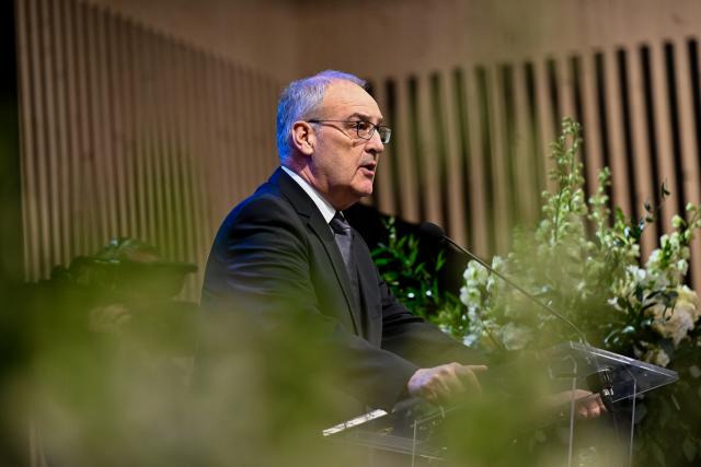 (260109) -- MARTIGNY, Jan. 9, 2026 (Xinhua) -- Swiss President Guy Parmelin participates in the national memorial service in Martigny, Switzerland, Jan. 9, 2026. Switzerland held a national memorial service on Friday to mourn the victims of a deadly New Year's Eve bar fire in the resort town of Crans-Montana, as authorities continued their investigation into the incident. Due to forecasts of heavy snowfall in Crans-Montana, Swiss authorities decided to hold the official ceremony in Martigny, more than 50 kilometers west of the resort town, citing safety concerns. (Federal Department of Foreign Affairs (FDFA)/Handout via Xinhua)