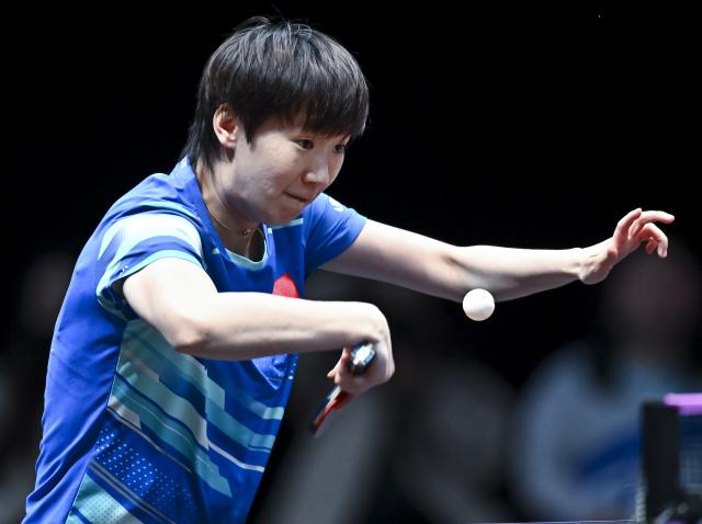 (260110) -- DOHA, Jan. 10, 2026 (Xinhua) -- Wang Manyu of China hits a return during the women's singles Round of 16 match against Prithika Pavade of France at the WTT Champions Doha 2026 in Doha, Qatar, on Jan. 9, 2026. (Photo by Nikku/Xinhua)