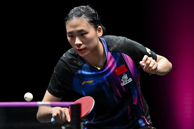 (260110) -- DOHA, Jan. 10, 2026 (Xinhua) -- Chen Yi of China hits a return during the women's singles Round of 16 match against Han Ying of Germany at the WTT Champions Doha 2026 in Doha, Qatar, on Jan. 9, 2026. (Photo by Nikku/Xinhua)