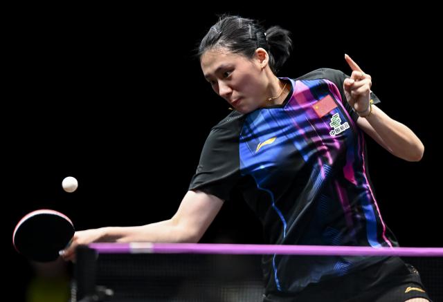 (260110) -- DOHA, Jan. 10, 2026 (Xinhua) -- Chen Yi of China hits a return during the women's singles Round of 16 match against Han Ying of Germany at the WTT Champions Doha 2026 in Doha, Qatar, on Jan. 9, 2026. (Photo by Nikku/Xinhua)