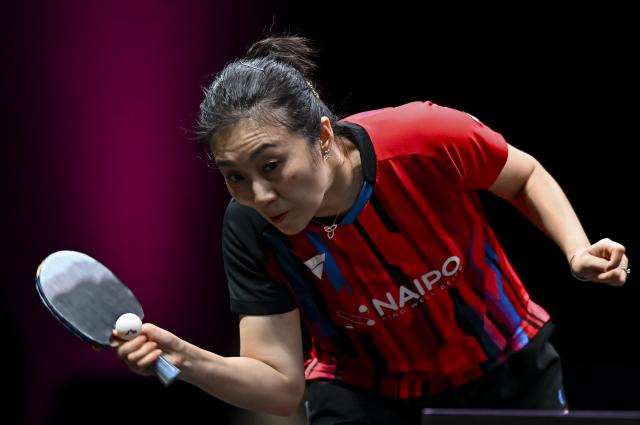 (260110) -- DOHA, Jan. 10, 2026 (Xinhua) -- Han Ying of Germany hits a return during the women's singles Round of 16 match against Chen Yi of China at the WTT Champions Doha 2026 in Doha, Qatar, on Jan. 9, 2026. (Photo by Nikku/Xinhua)