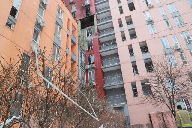 (260110) -- KIEV, Jan. 10, 2026 (Xinhua) -- This photo taken on Jan. 9, 2026 shows a damaged residential building after a massive drone and missile attack by Russia, in Kiev, Ukraine. Russia launched a massive drone and missile attack on Ukraine overnight Friday, killing at least four people and injuring 25 others in Kiev, authorities said. (Xinhua/Li Dongxu)