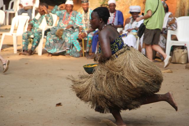 (260110) -- OUIDAH, Jan. 10, 2026 (Xinhua) -- A woman dressed in traditional costumes performs a dance to celebrate the Vodun Days in Ouidah, Benin, Jan. 8, 2026. The 2026 edition of Vodun Days is held from Jan. 8 to 10 in Ouidah, a historic cultural city in southwestern Benin, showcasing the diversity and vitality of Vodun culture through ritual demonstrations, dance and music performances, and art exhibitions. (Photo by Seraphin Zounyekpe/Xinhua)