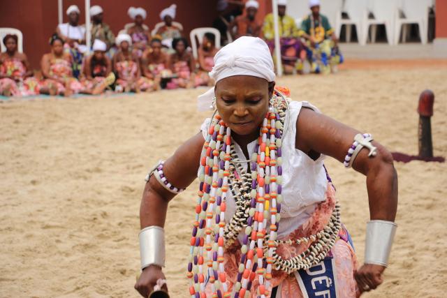 (260110) -- OUIDAH, Jan. 10, 2026 (Xinhua) -- A woman dressed in traditional costumes performs a dance to celebrate the Vodun Days in Ouidah, Benin, Jan. 9, 2026. The 2026 edition of Vodun Days is held from Jan. 8 to 10 in Ouidah, a historic cultural city in southwestern Benin, showcasing the diversity and vitality of Vodun culture through ritual demonstrations, dance and music performances, and art exhibitions. (Photo by Seraphin Zounyekpe/Xinhua)