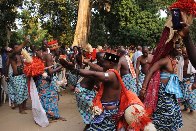 (260110) -- OUIDAH, Jan. 10, 2026 (Xinhua) -- Locals dressed in traditional costumes dance to celebrate the Vodun Days in Ouidah, Benin, Jan. 8, 2026. The 2026 edition of Vodun Days is held from Jan. 8 to 10 in Ouidah, a historic cultural city in southwestern Benin, showcasing the diversity and vitality of Vodun culture through ritual demonstrations, dance and music performances, and art exhibitions. (Photo by Seraphin Zounyekpe/Xinhua)