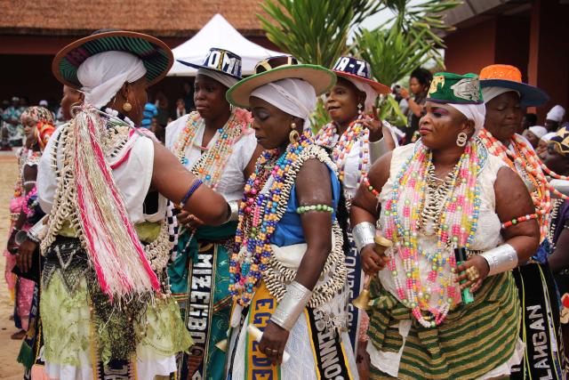 (260110) -- OUIDAH, Jan. 10, 2026 (Xinhua) -- This photo taken on Jan. 9, 2026 shows locals dressed in traditional costumes during the Vodun Days in Ouidah, Benin. The 2026 edition of Vodun Days is held from Jan. 8 to 10 in Ouidah, a historic cultural city in southwestern Benin, showcasing the diversity and vitality of Vodun culture through ritual demonstrations, dance and music performances, and art exhibitions. (Photo by Seraphin Zounyekpe/Xinhua)