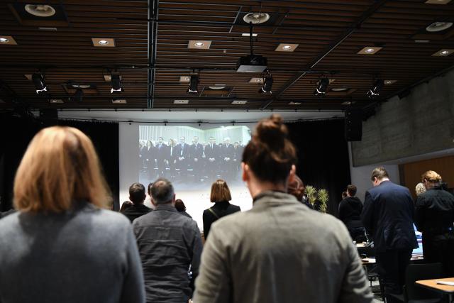 (260110) --  MARTIGNY, Jan. 10, 2026 (Xinhua) -- People mourn during the official memorial ceremony mourning the victims of a New Year's Eve bar fire at the press center in Martigny in Switzerland, Jan. 9, 2026. Switzerland held a national memorial service on Friday to mourn the victims of a deadly New Year's Eve bar fire in the resort town of Crans-Montana, as authorities continued their investigation into the incident.
   Due to forecasts of heavy snowfall in Crans-Montana, Swiss authorities decided to hold the official ceremony in Martigny, more than 50 kilometers west of the resort town, citing safety concerns. (Xinhua/Lian Yi)