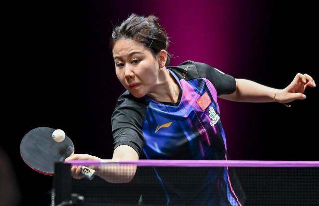 (260110) -- DOHA, Jan. 10, 2026 (Xinhua) -- Chen Xingtong of China hits a return during the women's singles Round of 16 match against Joo Cheonhui of South Korea at the WTT Champions Doha 2026 in Doha, Qatar, on Jan. 9, 2026. (Photo by Nikku/Xinhua)