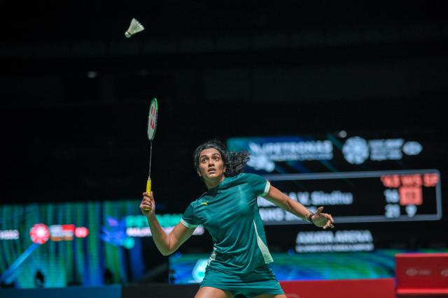 (260110) -- KUALA LUMPUR, Jan. 10, 2026 (Xinhua) -- Pusarla V. Sindhu of India hits a return during the women's singles semifinal match against Wang Zhiyi of China at the Malaysia Open 2026 badminton tournament in Kuala Lumpur, Malaysia, Jan. 10, 2026. (Photo by Chong Voon Chung/Xinhua)