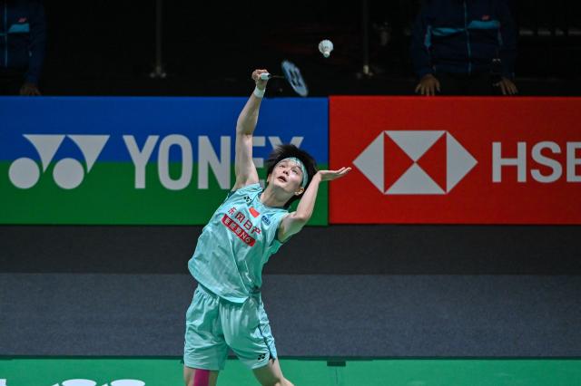 (260110) -- KUALA LUMPUR, Jan. 10, 2026 (Xinhua) -- Wang Zhiyi of China hits a return during the women's singles semifinal match against Pusarla V. Sindhu of India at the Malaysia Open 2026 badminton tournament in Kuala Lumpur, Malaysia, Jan. 10, 2026. (Photo by Chong Voon Chung/Xinhua)