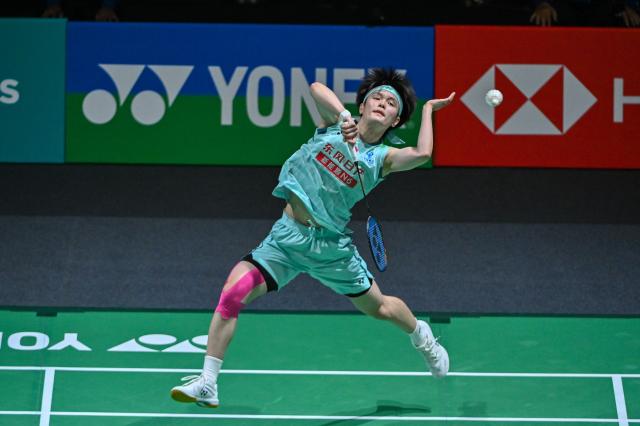 (260110) -- KUALA LUMPUR, Jan. 10, 2026 (Xinhua) -- Wang Zhiyi of China hits a return during the women's singles semifinal match against Pusarla V. Sindhu of India at the Malaysia Open 2026 badminton tournament in Kuala Lumpur, Malaysia, Jan. 10, 2026. (Photo by Chong Voon Chung/Xinhua)