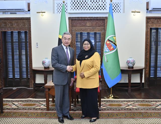 (260110) -- DAR ES SALAAM, Jan. 10, 2026 (Xinhua) -- Tanzanian President Samia Suluhu Hassan meets with Chinese Foreign Minister Wang Yi, also a member of the Political Bureau of the Communist Party of China Central Committee, in Dar-es-Salaam, Tanzania, Jan. 10, 2026. (Xinhua/Liu Qiong)