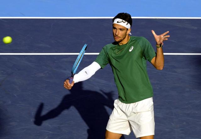 (260110) -- HONG KONG, Jan. 10, 2026 (Xinhua) -- Lorenzo Musetti competes during the men's singles semifinal between Andry Rublev of Russia and Lorenzo Musetti of Italy at the ATP Hong Kong Open tennis tournament in Hong Kong, China, Jan. 10, 2026. (Xinhua/Lo Ping Fai)