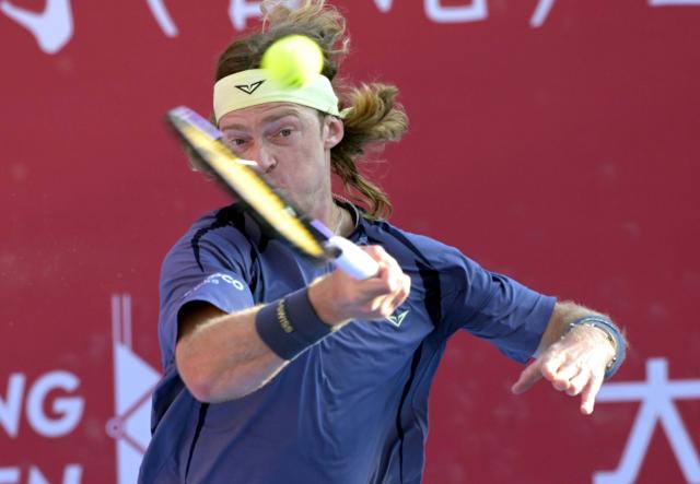 (260110) -- HONG KONG, Jan. 10, 2026 (Xinhua) -- Andrey Rublev competes during the men's singles semifinal between Andry Rublev of Russia and Lorenzo Musetti of Italy at the ATP Hong Kong Open tennis tournament in Hong Kong, China, Jan. 10, 2026. (Xinhua/Lo Ping Fai)
