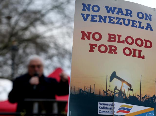 (260111) -- LONDON, Jan. 11, 2026 (Xinhua) -- A placard is seen during a protest condemning U.S. attack on Venezuela outside No. 10 Downing Street in London, Britain, Jan. 10, 2026. (Xinhua/Li Ying)