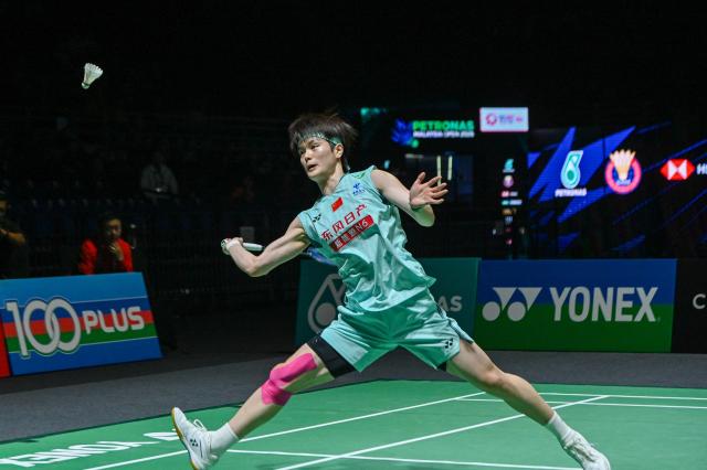 (260111) -- KUALA LUMPUR, Jan. 11, 2026 (Xinhua) -- Wang Zhiyi of China hits a return during the women's singles final match against An Se Young of South Korea at the Malaysia Open 2026 badminton tournament in Kuala Lumpur, Malaysia, Jan. 11, 2026. (Photo by Chong Voon Chung/Xinhua)