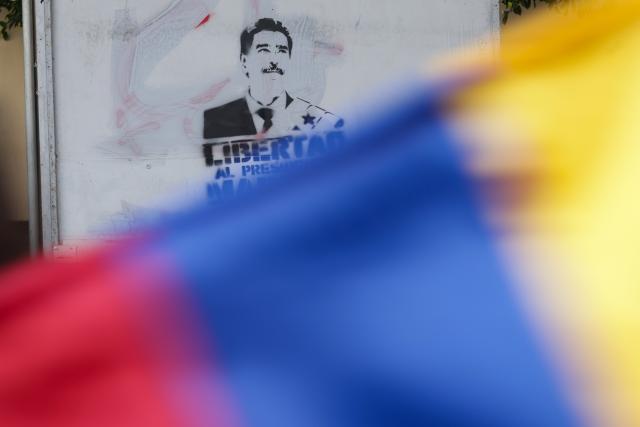 (260111) -- MEXICO CITY, Jan. 11, 2026 (Xinhua) -- A slogan is seen during a protest condemning U.S. attack on Venezuela in Mexico City, Mexico, Jan. 10, 2026. (Photo by Francisco Canedo/Xinhua)