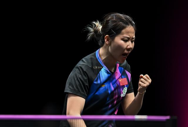 (260111) -- DOHA, Jan. 11, 2026 (Xinhua) -- Chen Xingtong of China reacts during the women's singles quarter-final match against Harimoto Miwa of Japan at the WTT Champions Doha 2026 in Doha, Qatar, on Jan. 10, 2026. (Photo by Nikku/Xinhua)