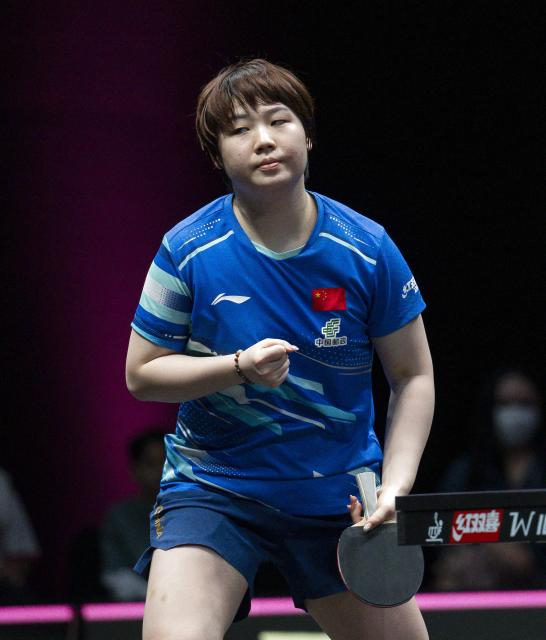 (260111) -- DOHA, Jan. 11, 2026 (Xinhua) -- Kuai Man of China reacts during the women's singles quarter-final match against Nagasaki Miyu of Japan at the WTT Champions Doha 2026 in Doha, Qatar, on Jan. 10, 2026. (Photo by Nikku/Xinhua)