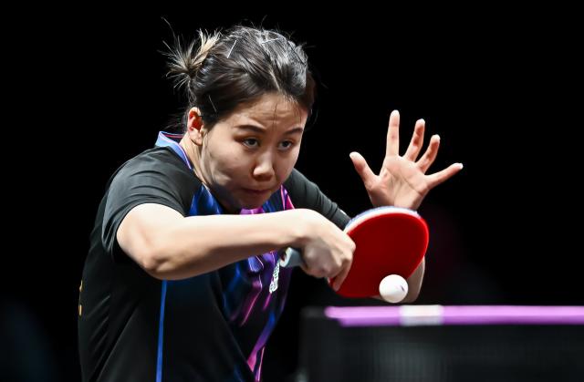 (260111) -- DOHA, Jan. 11, 2026 (Xinhua) -- Chen Xingtong of China hits a return during the women's singles quarter-final match against Harimoto Miwa of Japan at the WTT Champions Doha 2026 in Doha, Qatar, on Jan. 10, 2026. (Photo by Nikku/Xinhua)