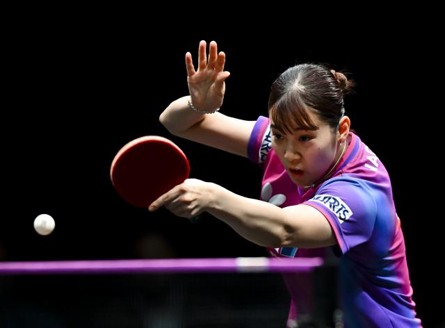 (260111) -- DOHA, Jan. 11, 2026 (Xinhua) -- Nagasaki Miyu of Japan hits a return during the women's singles quarter-final match against Kuai Man of China at the WTT Champions Doha 2026 in Doha, Qatar, on Jan. 10, 2026. (Photo by Nikku/Xinhua)
