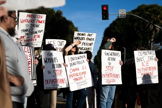 (260111) -- SAN FRANCISCO, Jan. 11, 2026 (Xinhua) -- People attend a protest in San Francisco, California, the United States, on Jan. 10, 2026. People gathered here to protest against the U.S. attack on Venezuela, as well as a fatal shooting of a 37-year-old woman by an Immigration and Customs Enforcement agent in Minnesota on Jan. 7. (Photo by Ziyu Julian Zhu/Xinhua)