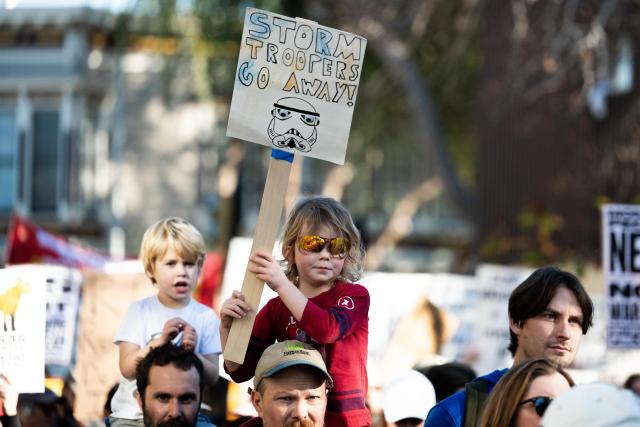 (260111) -- SAN FRANCISCO, Jan. 11, 2026 (Xinhua) -- People attend a protest in San Francisco, California, the United States, on Jan. 10, 2026. People gathered here to protest against the U.S. attack on Venezuela, as well as a fatal shooting of a 37-year-old woman by an Immigration and Customs Enforcement agent in Minnesota on Jan. 7. (Photo by Ziyu Julian Zhu/Xinhua)