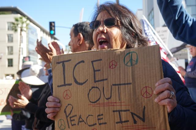 (260111) -- LOS ANGELES, Jan. 11, 2026 (Xinhua) -- A protester holding a placard participates in a protest against the Immigration and Customs Enforcement (ICE) in Pasadena, Los Angeles County, California, the United States, on Jan. 10, 2026. TO GO WITH "Dozens of protests against ICE held across U.S. California" (Xinhua)