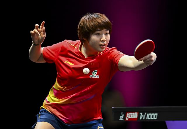 (260111) -- DOHA, Jan. 11, 2026 (Xinhua) -- Kuai Man of China hits a return during the women's singles semifinal match against Chen Xingtong of China at the WTT Champions Doha 2026 in Doha, Qatar, Jan. 11, 2026. (Photo by Nikku/Xinhua)