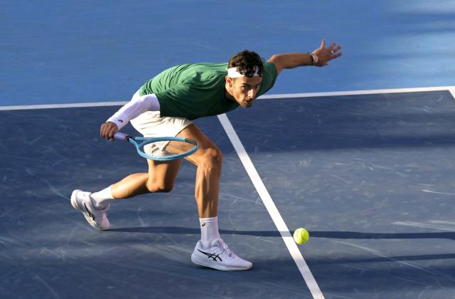 (260111) -- HONG KONG, Jan. 11, 2026 (Xinhua) -- Lorenzo Musetti competes during the men's singles final between Alexander Bublik of Kazakhstan and Lorenzo Musetti of Italy at the ATP Hong Kong Open tennis tournament in Hong Kong, China, Jan. 11, 2026. (Xinhua/Lo Ping Fai)