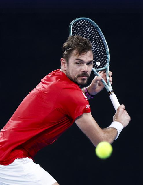 (260111) -- SYDNEY, Jan. 11, 2026 (Xinhua) -- Stan Wawrinka of Team Switzerland hits a return during the men's singles match against Hubert Hurkacz of Team Poland at the 2026 United Cup tennis tournament final in Sydney, Australia, Jan. 11, 2026. (Xinhua/Ma Ping)