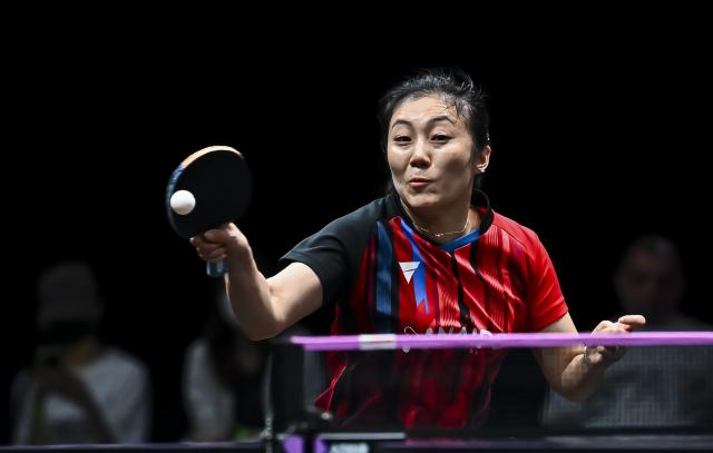 (260111) -- DOHA, Jan. 11, 2026 (Xinhua) -- Han Ying of Germany hits a return during the women's singles semifinal match against Zhu Yuling of China's Macao at the WTT Champions Doha 2026 in Doha, Qatar, Jan. 11, 2026. (Photo by Nikku/Xinhua)