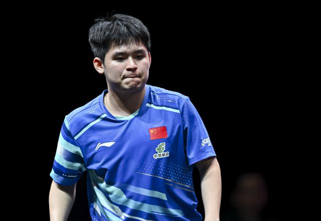 (260111) -- DOHA, Jan. 11, 2026 (Xinhua) -- Lin Shidong of China reacts during the men's singles semifinal match against Jang Woojin of South Korea at the WTT Champions Doha 2026 in Doha, Qatar, Jan. 11, 2026. (Photo by Nikku/Xinhua)