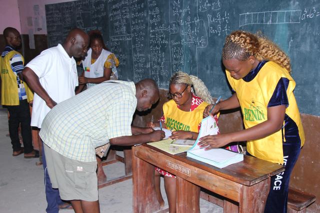 (260111) -- OUIDAH, Jan. 11, 2026 (Xinhua) -- A man signs the register after casting his ballot at a polling station in Ouidah, Benin, Jan. 11, 2026. Voting operations for Benin's 2026 legislative and municipal elections officially began across the country on Sunday, though slight delays were reported at some polling stations.
   Under Benin's electoral code, voting operations are scheduled to last 10 hours from the opening of each polling station. More than 7.8 million registered voters are expected to cast ballots at about 17,000 polling stations nationwide. (Photo by Seraphin Zounyekpe/Xinhua)