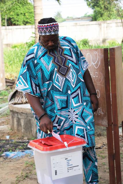 (260111) -- OUIDAH, Jan. 11, 2026 (Xinhua) -- A man casts his ballot at a polling station in Ouidah, Benin, Jan. 11, 2026. Voting operations for Benin's 2026 legislative and municipal elections officially began across the country on Sunday, though slight delays were reported at some polling stations.
   Under Benin's electoral code, voting operations are scheduled to last 10 hours from the opening of each polling station. More than 7.8 million registered voters are expected to cast ballots at about 17,000 polling stations nationwide. (Photo by Seraphin Zounyekpe/Xinhua)