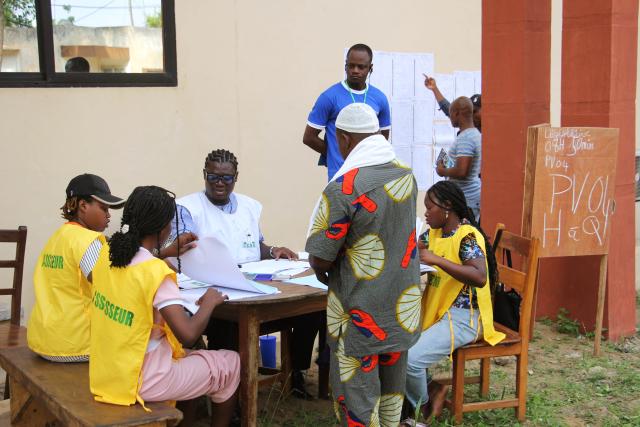 (260111) -- OUIDAH, Jan. 11, 2026 (Xinhua) -- Election officials work at a polling station in Ouidah, Benin, Jan. 11, 2026. Voting operations for Benin's 2026 legislative and municipal elections officially began across the country on Sunday, though slight delays were reported at some polling stations.
   Under Benin's electoral code, voting operations are scheduled to last 10 hours from the opening of each polling station. More than 7.8 million registered voters are expected to cast ballots at about 17,000 polling stations nationwide. (Photo by Seraphin Zounyekpe/Xinhua)