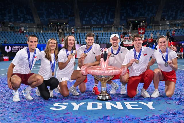 (260112) -- SYDNEY, Jan. 12, 2026 (Xinhua) -- Team Poland celebrate winning the final match against team Switzerland at the 2026 United Cup tennis tournament in Sydney, Australia, Jan. 11, 2026. TO GO WITH "Poland edge Switzerland to win United Cup title". MANDATORY CREDIT. This content is intended for editorial use only. For other uses, additional clearances may be required. Image Copyright - Tennis Australia (Tennis Australia/Handout via Xinhua)