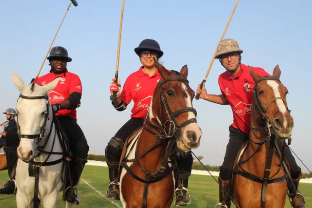 (260112) -- MARSA ALAM, Jan. 12, 2026 (Xinhua) -- Tourists play Chovqan, a traditional horseback game, in Marsa Alam, a resort city on Egypt's Red Sea coast, on Jan. 8, 2026. TO GO WITH "Roundup: Red Sea resort city spotlights Chovqan as Egypt taps sports tourism potential" (Str/Xinhua)
