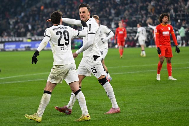 (260112) -- MOENCHENGLADBACH, Jan. 12, 2026 (Xinhua) -- Haris Tabakovic (front R) of Borussia Moenchengladbach celebrates scoring with Joe Scally during the German first division of Bundesliga football match between Borussia Moenchengladbach and FC Augsburg in Moenchengladbach, Germany, Jan. 11, 2026. (Photo by Ulrich Hufnagel/Xinhua)