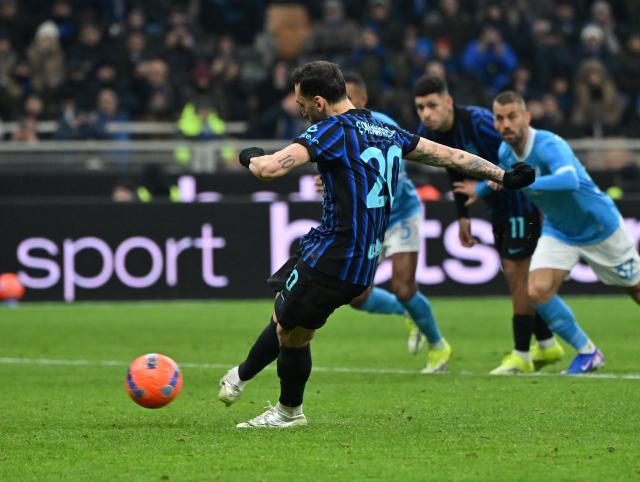 (260112) -- MILAN, Jan. 12, 2026 (Xinhua) -- Inter Milan's Hakan Calhanoglu scores penalty goal during a Serie A football match between Inter Milan and Napoli in Milan, Italy, Jan. 11, 2026. (Photo by Alberto Lingria/Xinhua)