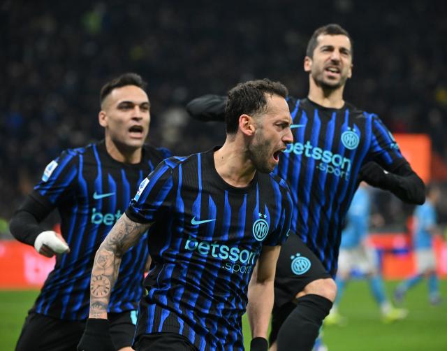 (260112) -- MILAN, Jan. 12, 2026 (Xinhua) -- Inter Milan's Hakan Calhanoglu (C) celebrates his goal during a Serie A football match between Inter Milan and Napoli in Milan, Italy, Jan. 11, 2026. (Photo by Alberto Lingria/Xinhua)
