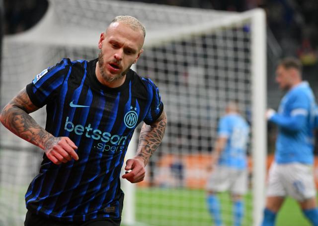 (260112) -- MILAN, Jan. 12, 2026 (Xinhua) -- Inter Milan's Federico Dimarco celebrates his goal during a Serie A football match between Inter Milan and Napoli in Milan, Italy, Jan. 11, 2026. (Photo by Alberto Lingria/Xinhua)